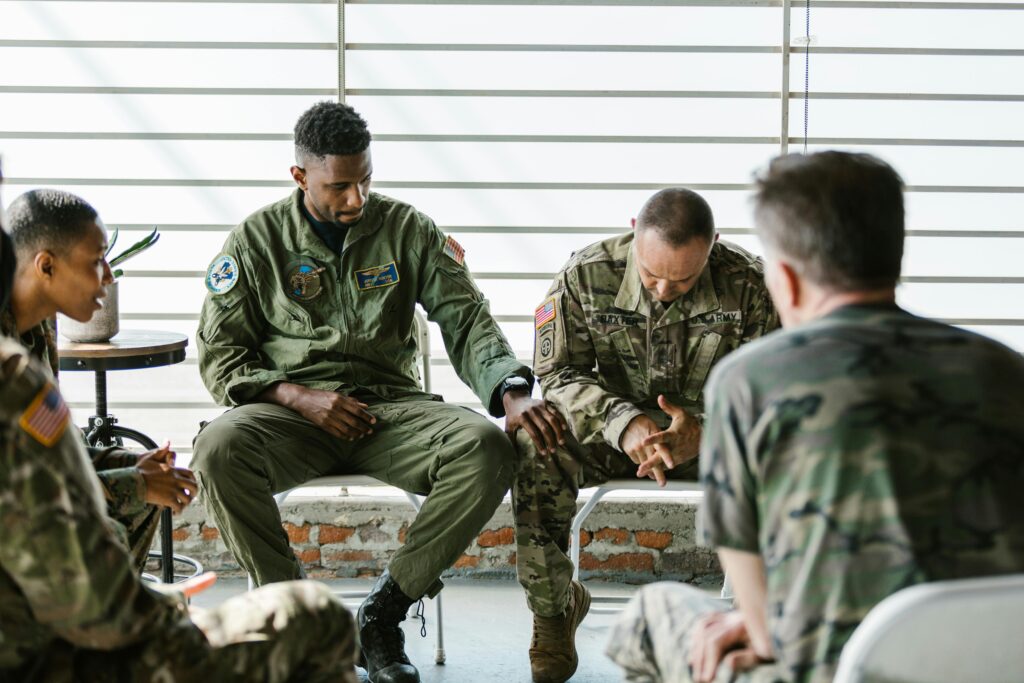 Military personel in a group counseling session.